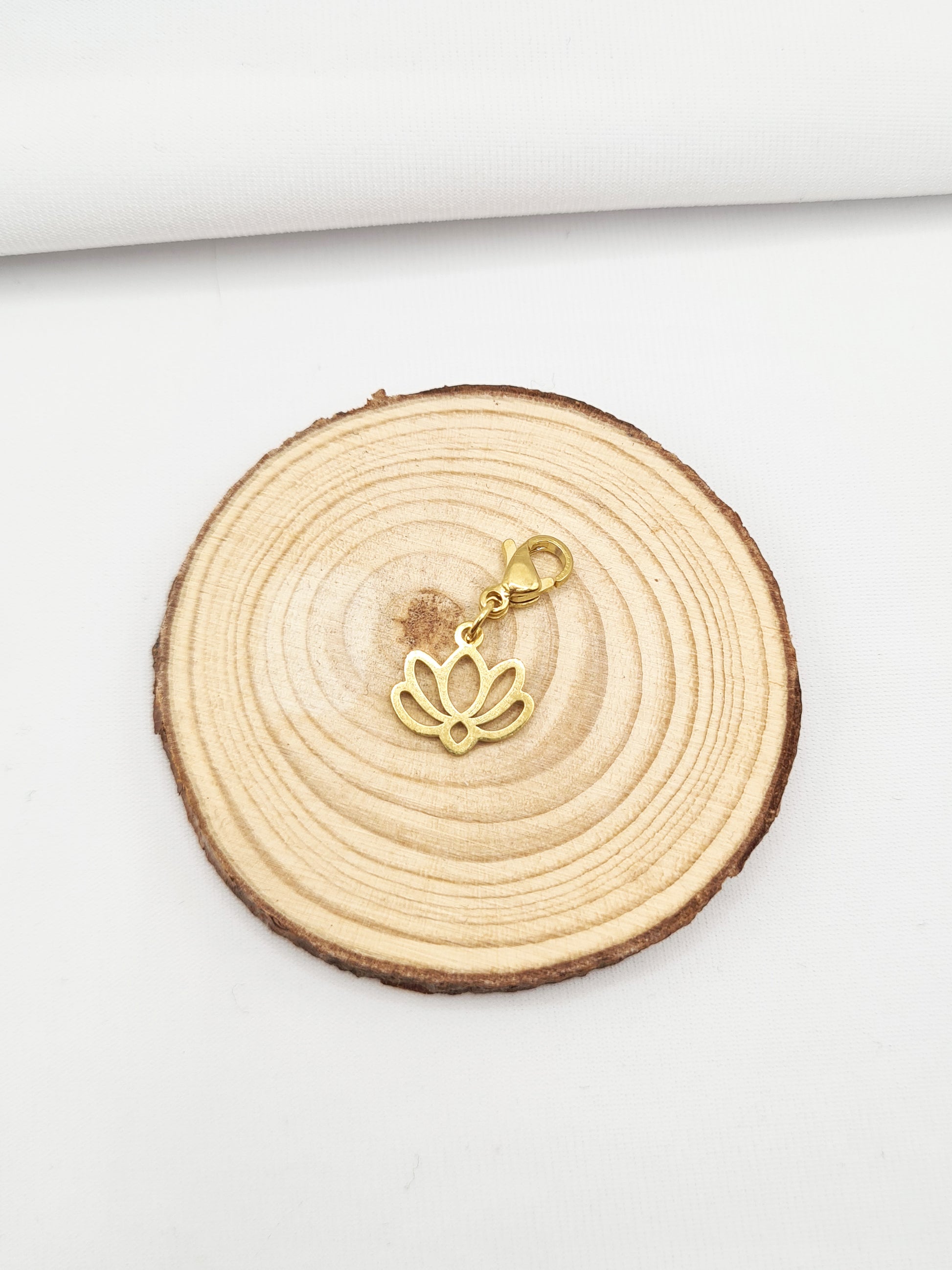 pampille en acier inoxydable doré et argenté - Lotus