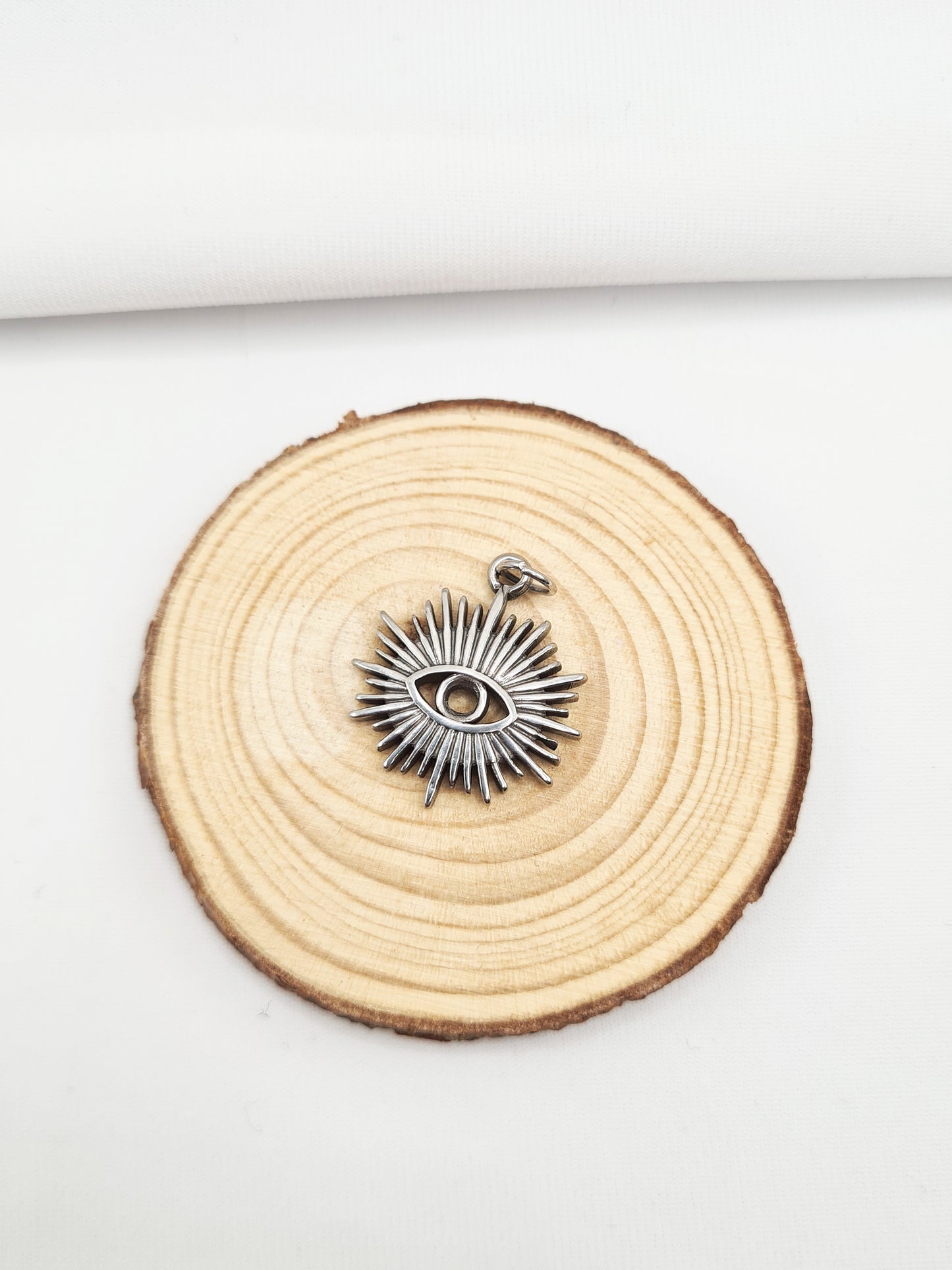 Pampille en acier inoxydable doré et argenté - Oeil de protection solaire