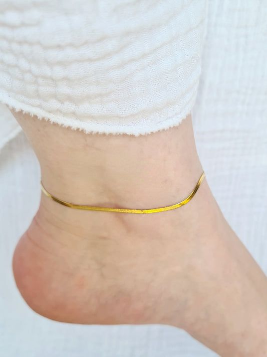 Grâce est une chaîne de cheville en acier inoxydable doré