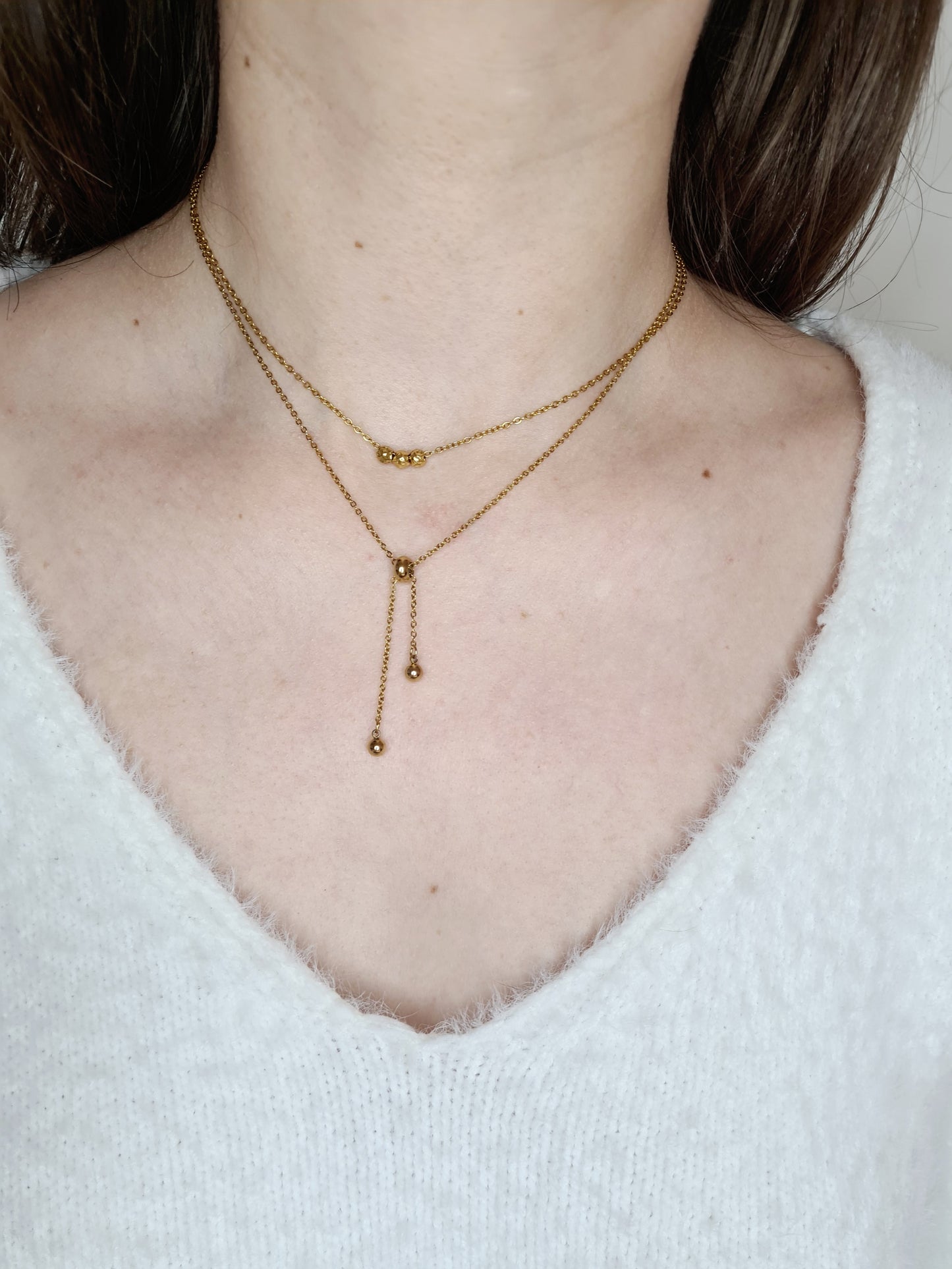 Mira est un collier en acier inoxydable doré