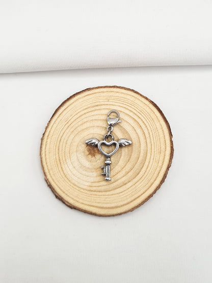 pampille en acier inoxydable doré et argenté - Coeur d'ange