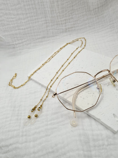 Charley est une chaîne de lunettes composé en acier inoxydable doré