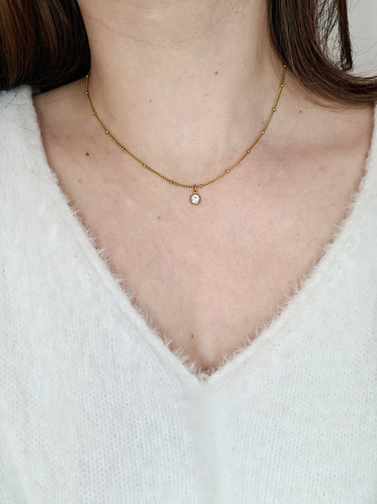 Foudre est un collier en acier inoxydable doré