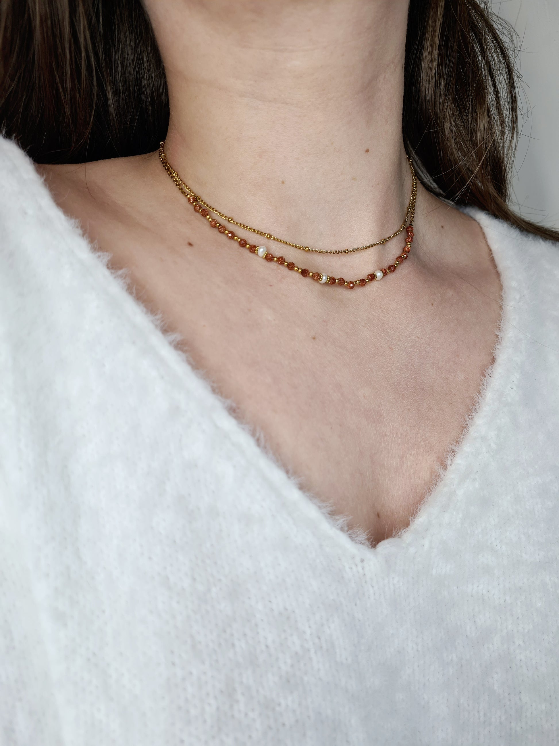 Myriam est un collier en acier inoxydable doré composé de véritable Perles d’eau douce